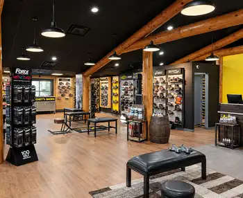 Work boot displays, fitting benches and seating inside the Chet&rsquo;s Shoes store in Spring Lake Park, Minnesota