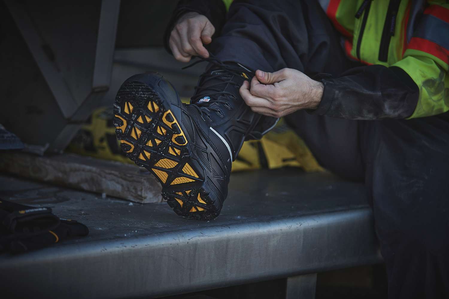 The Crossbow 777 diamond cleat outsole, seen while lacing up