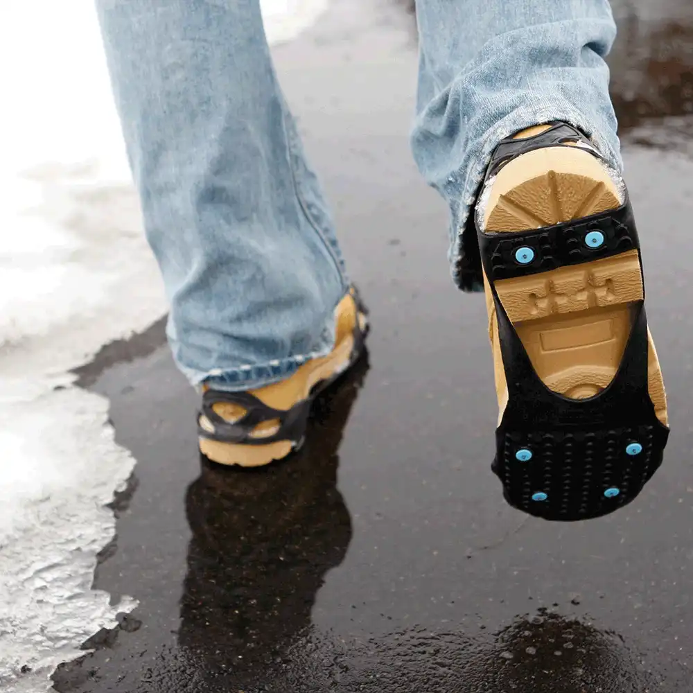 Walking across wet ice in DueNorth All Purpose traction aids