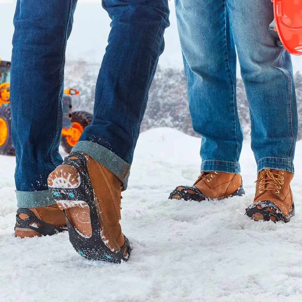 Walking through snow in DueNorth All Purpose traction aids