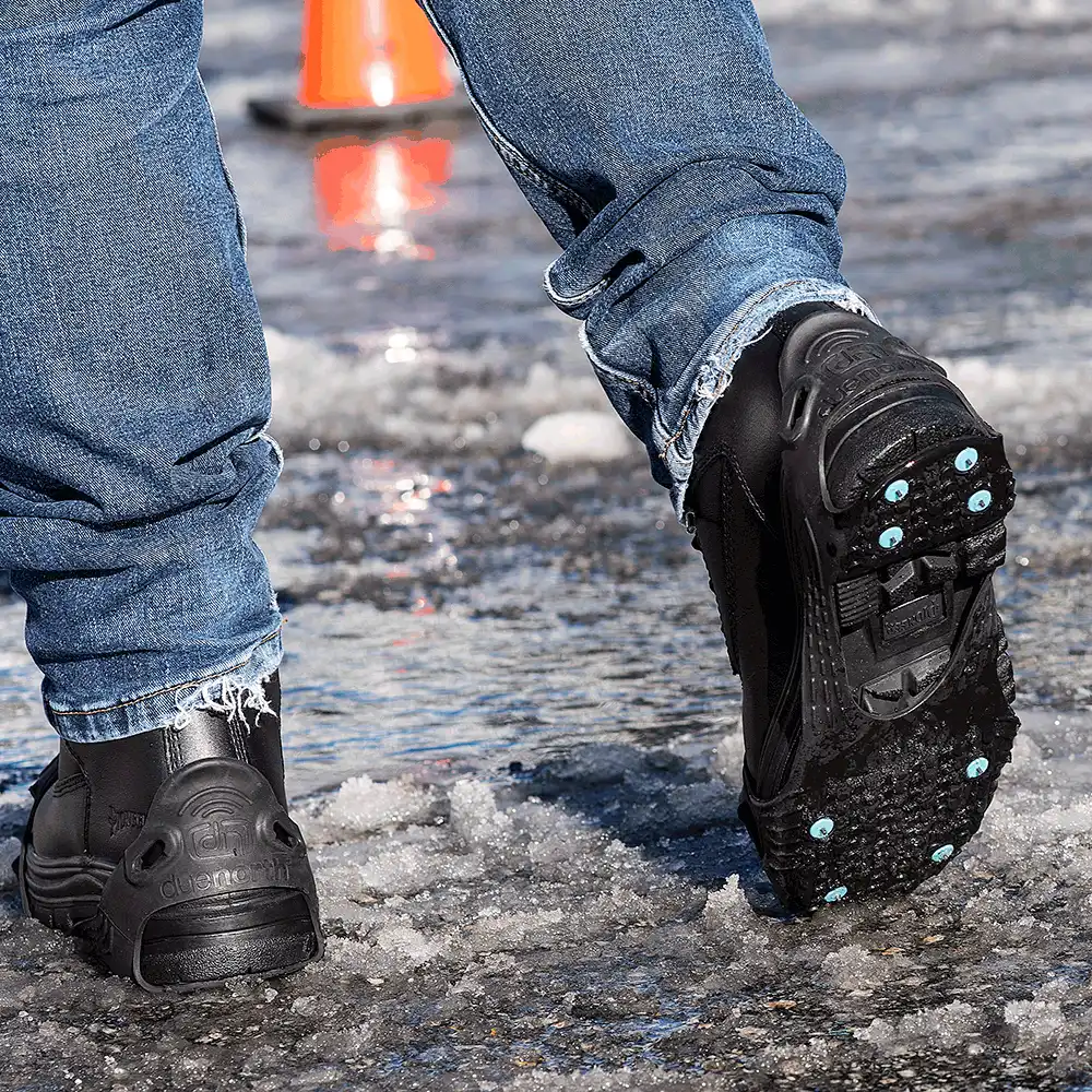 Walking through slush in DueNorth All Purpose Industrial traction aids
